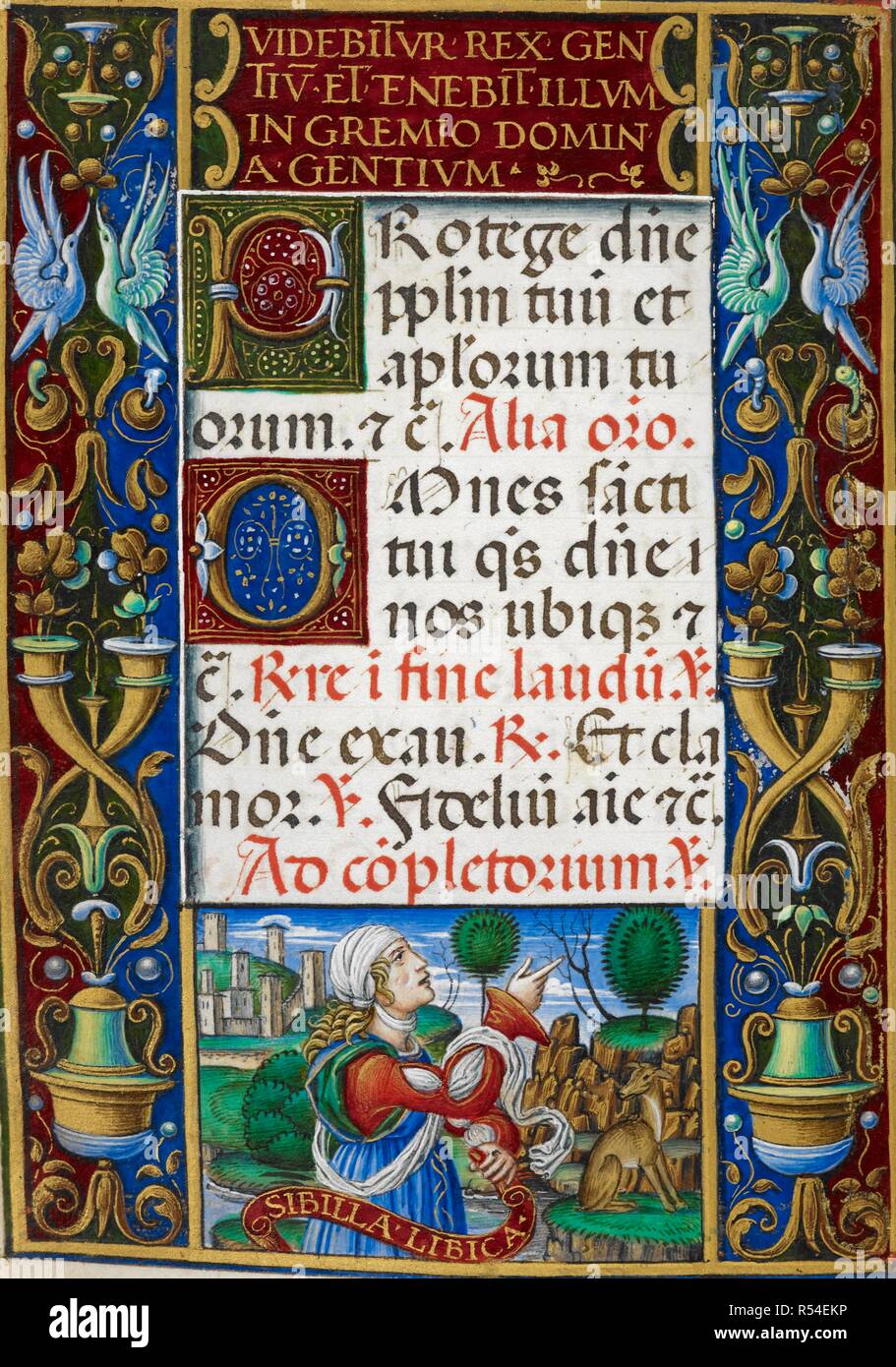 Pagina di testo da ore della Vergine con la decorazione del bordo che mostra la Sibilla libica in un paesaggio. Sforza ore. Milano, circa 1490; Fiammingo inserzioni, 1517-1520. Fonte: Aggiungi. 34294, f.123v. Lingue: Latina. Autore: Birago Giovan Pietro. Foto Stock