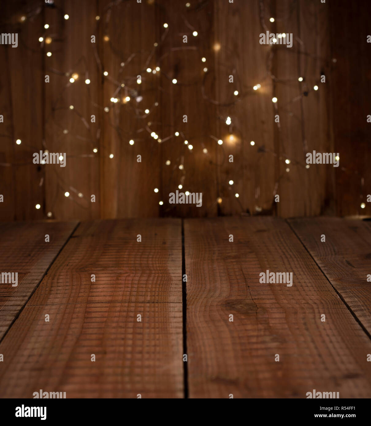 Natale sfondo bokeh di fondo con legno vuota Foto Stock