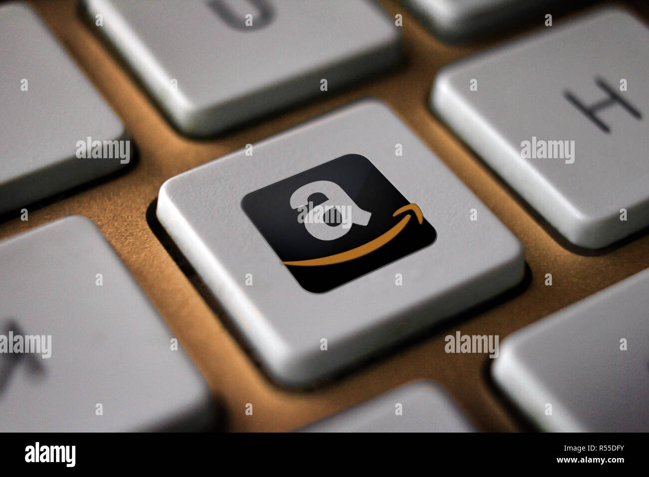 Il logo Amazon icona sulla tastiera del computer il tasto, illustrazione  del pulsante Foto stock - Alamy