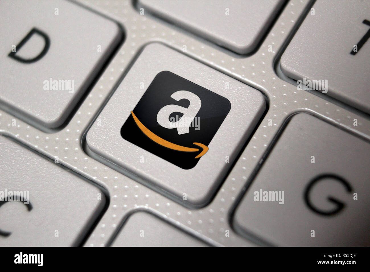Il logo Amazon icona sulla tastiera del computer il tasto, illustrazione del  pulsante Foto stock - Alamy