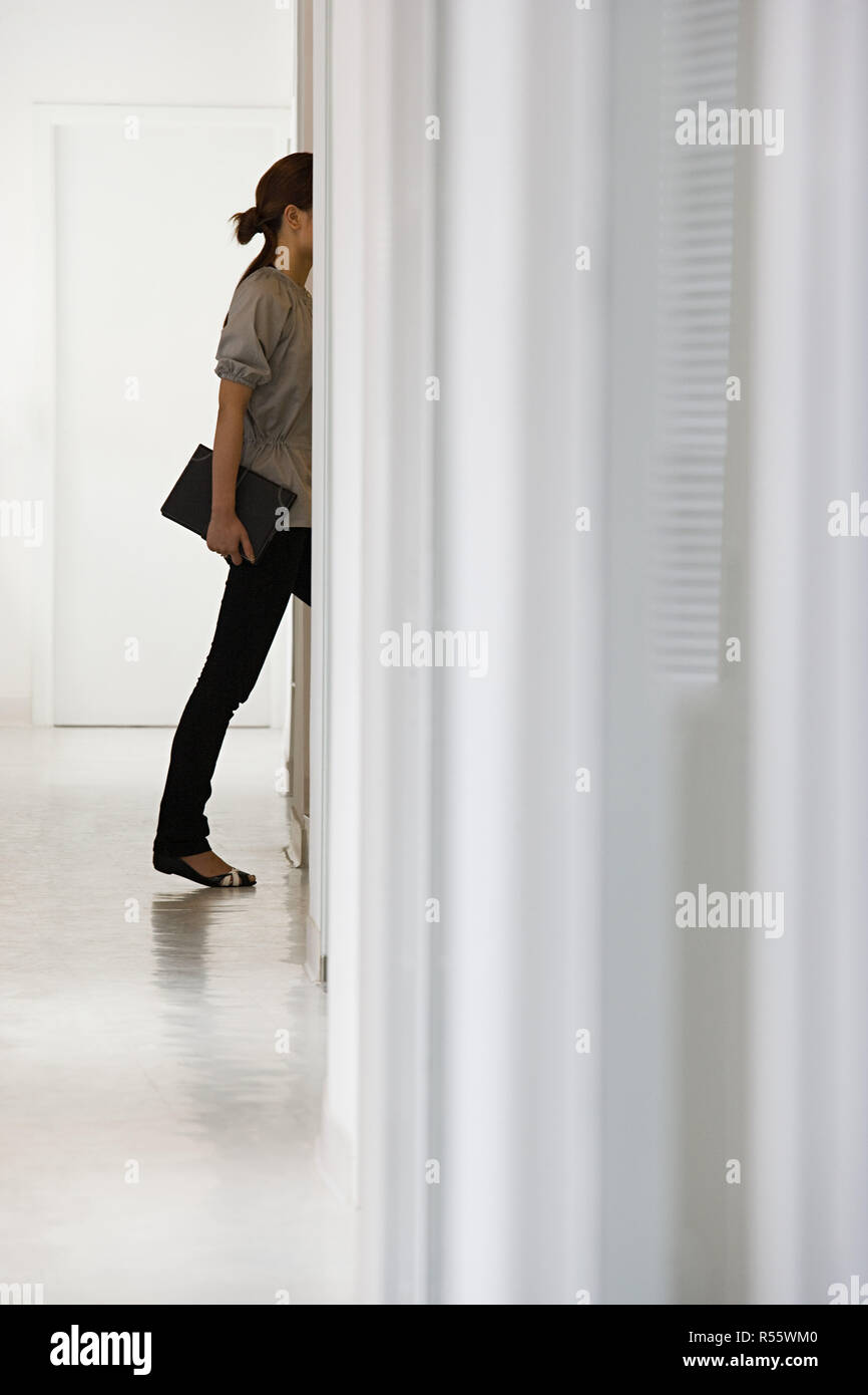 Donna in ufficio Foto Stock