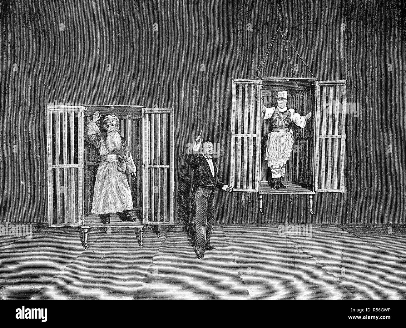 L'Illusionista Thorn dimostra la comparsa e scomparsa di persone in gabbie, 1880, xilografia, Inghilterra Foto Stock