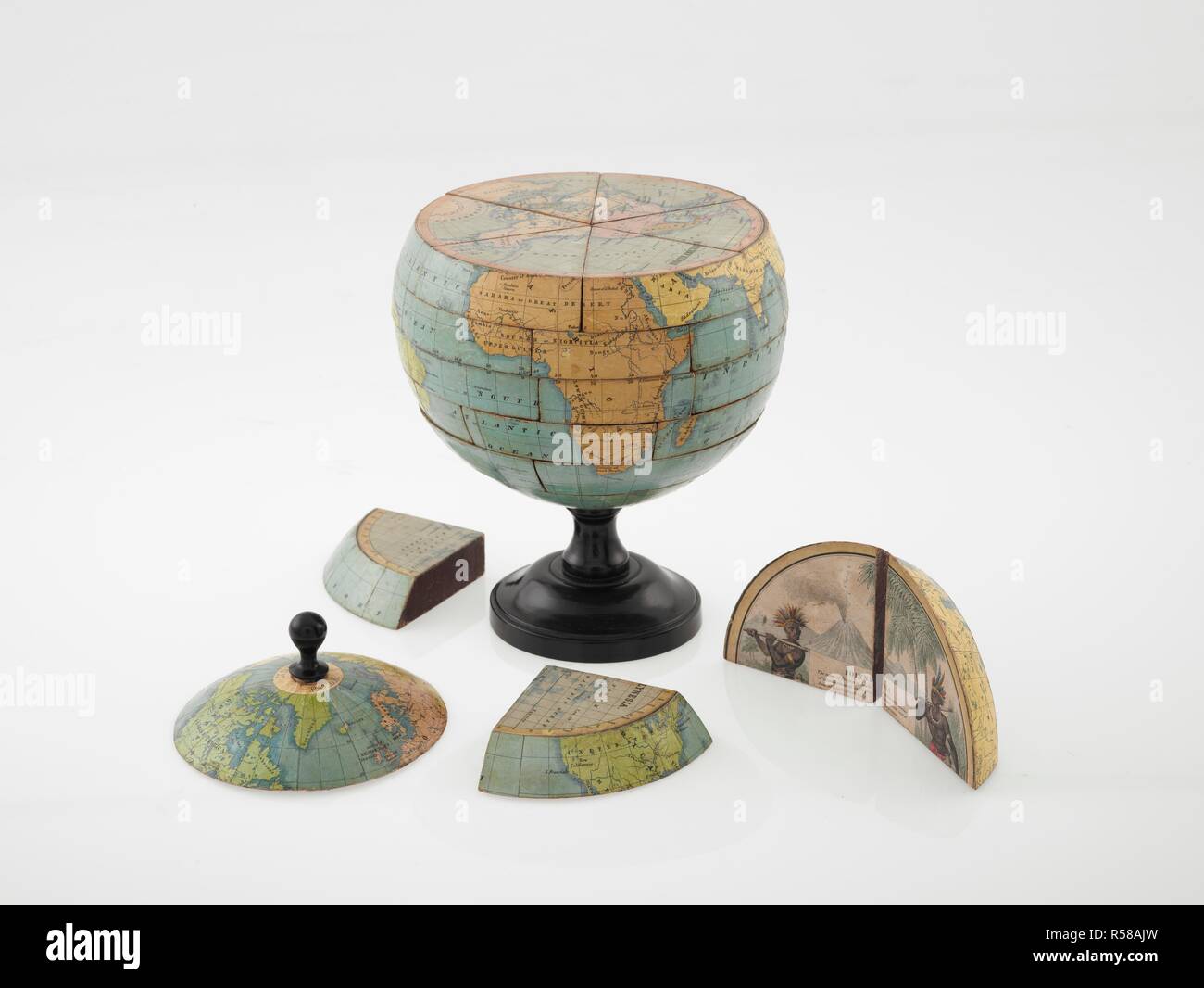 Un dissezionati globe, c.1866. Il dissezionati globo. [Londra?] : [A. & N. Myers?], [1866?]. La forma di segmenti di otto sezioni. Sei di questi visualizza mappe dei continenti sulle loro superfici superiori e le illustrazioni di testo sulle loro superfici inferiori. Descrizione fisica: 1 globo (38 segmenti di legno) : mano col ; 17cm. di diam. Fonte: Mappe G.3 visualizza 7. Foto Stock