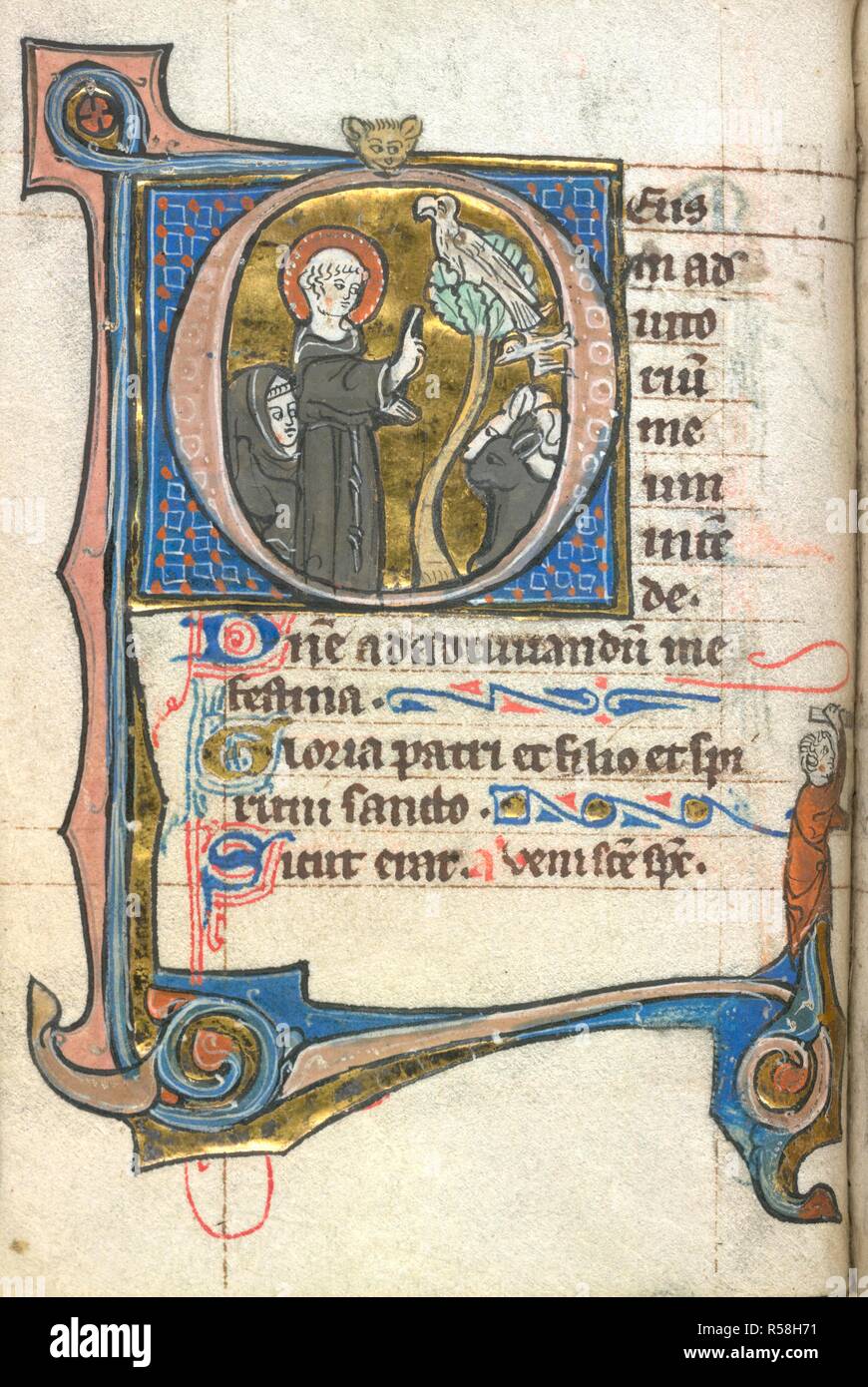 San Francesco che predica. Libro d Ore. S. Paesi Bassi; inizi del XIV secolo. [Intero folio] Office della Vergine a Lodi. Prima 'D', San Francesco con un compagno di predicazione di un uccello in un albero e due altri animali immagine presa dal Libro delle ore. Originariamente pubblicato/prodotto in S. Paesi Bassi; inizi del XIV secolo. . Fonte: Aggiungi. 17444, f.30v. Lingue: Latina. Foto Stock