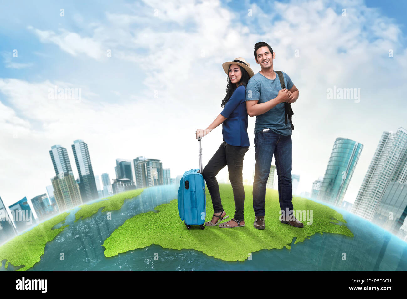 Giovani viaggiatori asiatici giovane portare bagagli Foto Stock