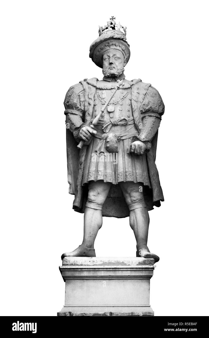 La figura del re Henry 8th, re d'Inghilterra sorge in una nicchia sopra l'entrata di San Bartolomeo del Hospital di Londra UK. Foto Stock