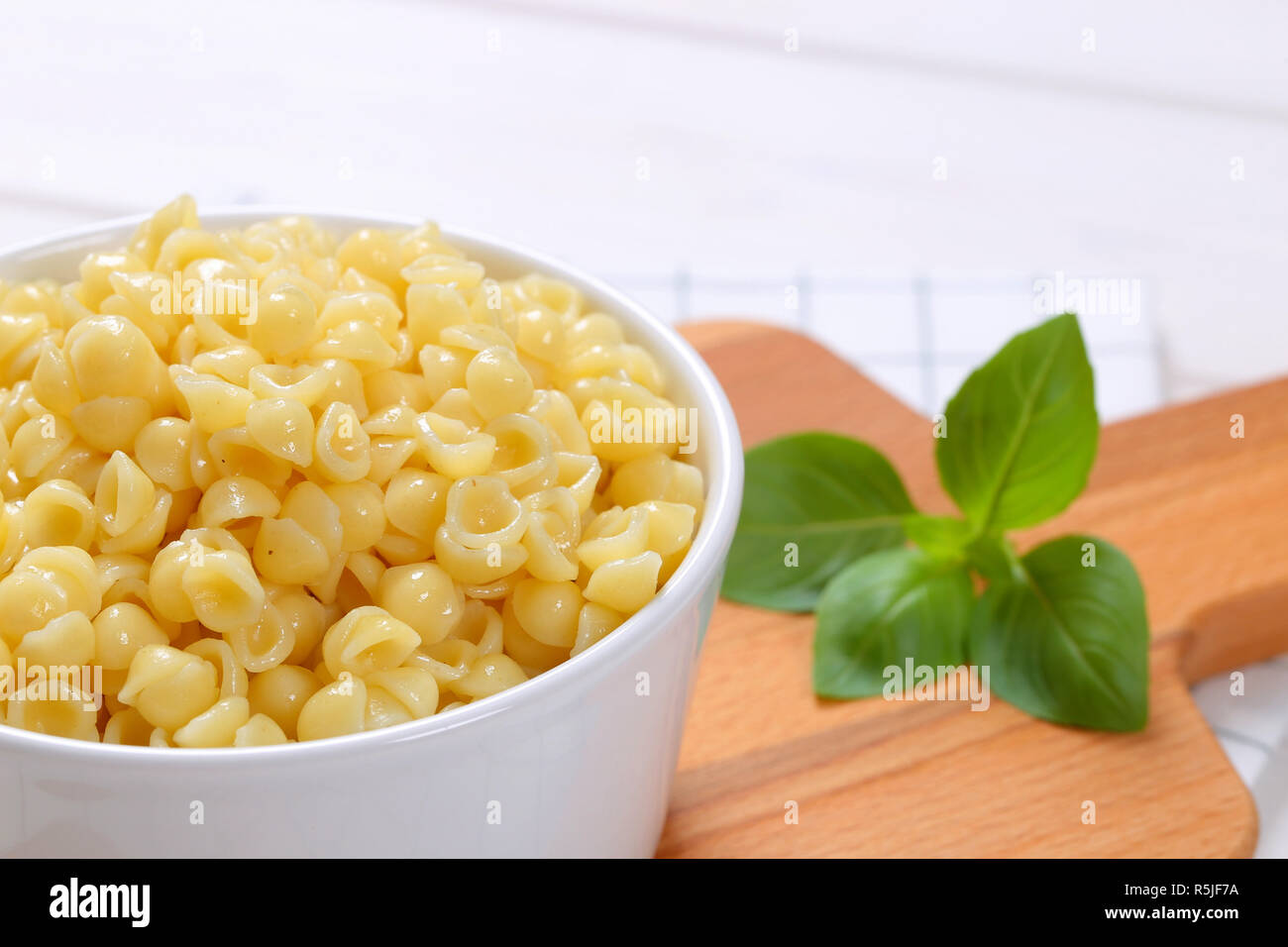 Piccole conchiglie di pasta Foto Stock