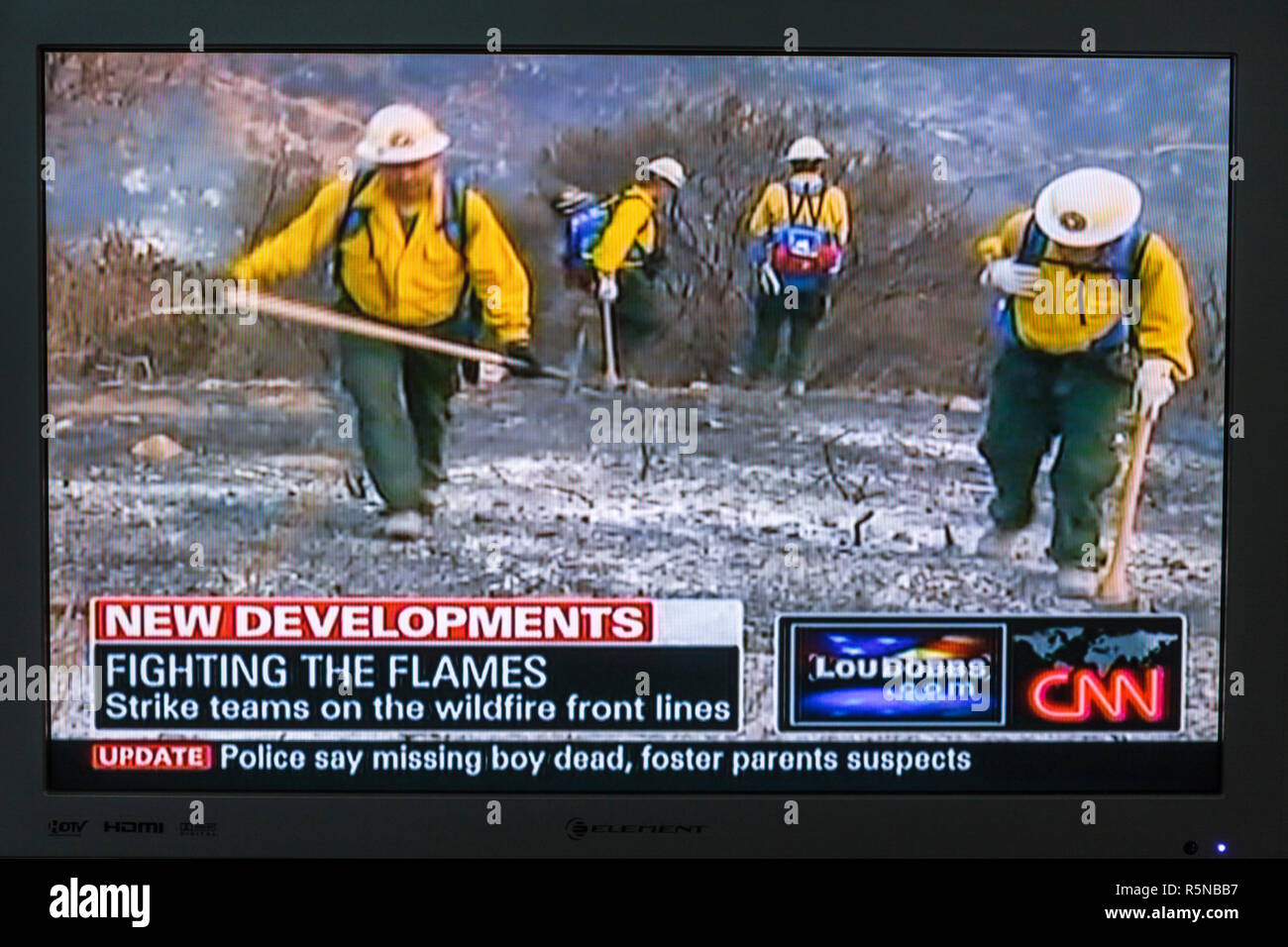 Miami Beach Florida,TV a schermo piatto,televisione,set,screen shot,media,news,newscast,broadcast,cable,CNN,wildfire,vigili del fuoco,disastro,aggiornamenti,FL0909120 Foto Stock