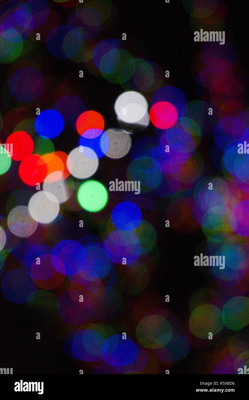 Rosso, verde, bianco e blu bokeh di fondo sul nero. Foto Stock Rosso, verde, bianco e blu bokeh di fondo sul nero. Foto Stock