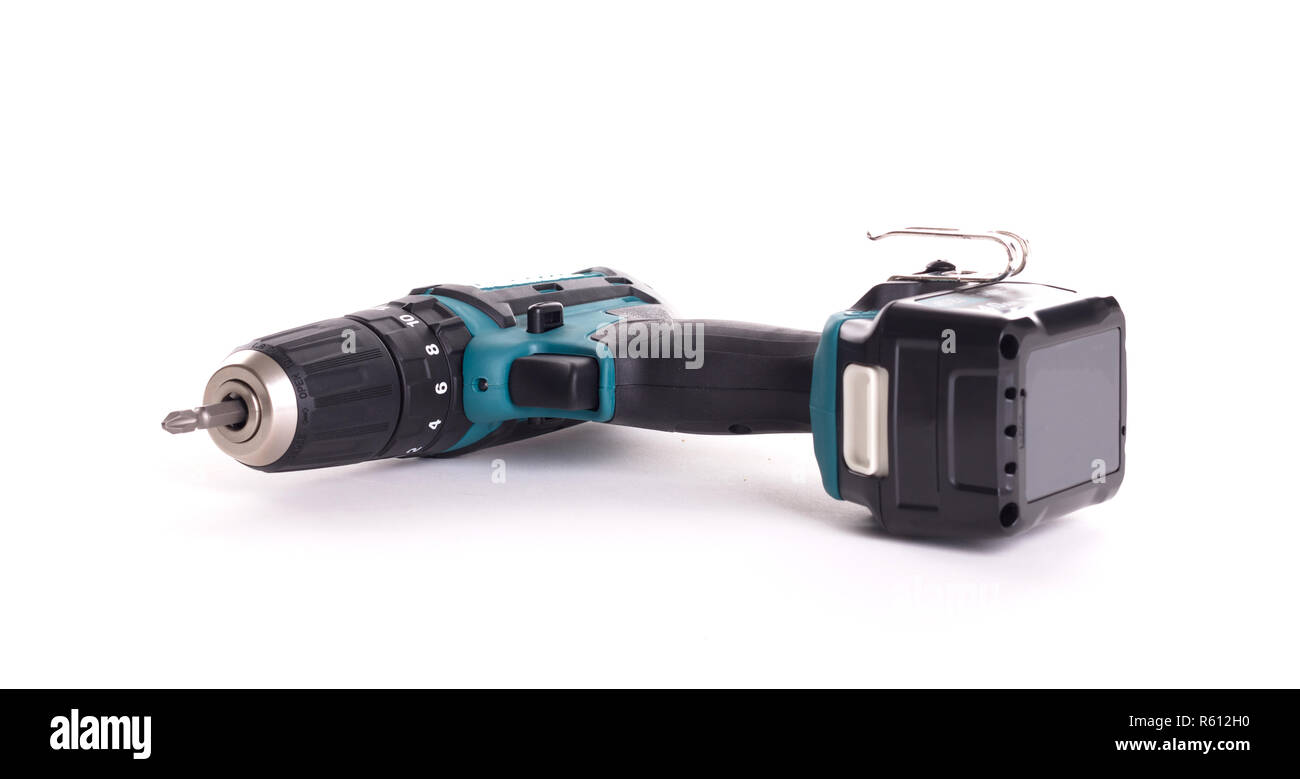 Giraviti a batteria o alimentazione di trapanare isolata su uno sfondo nero Foto Stock
