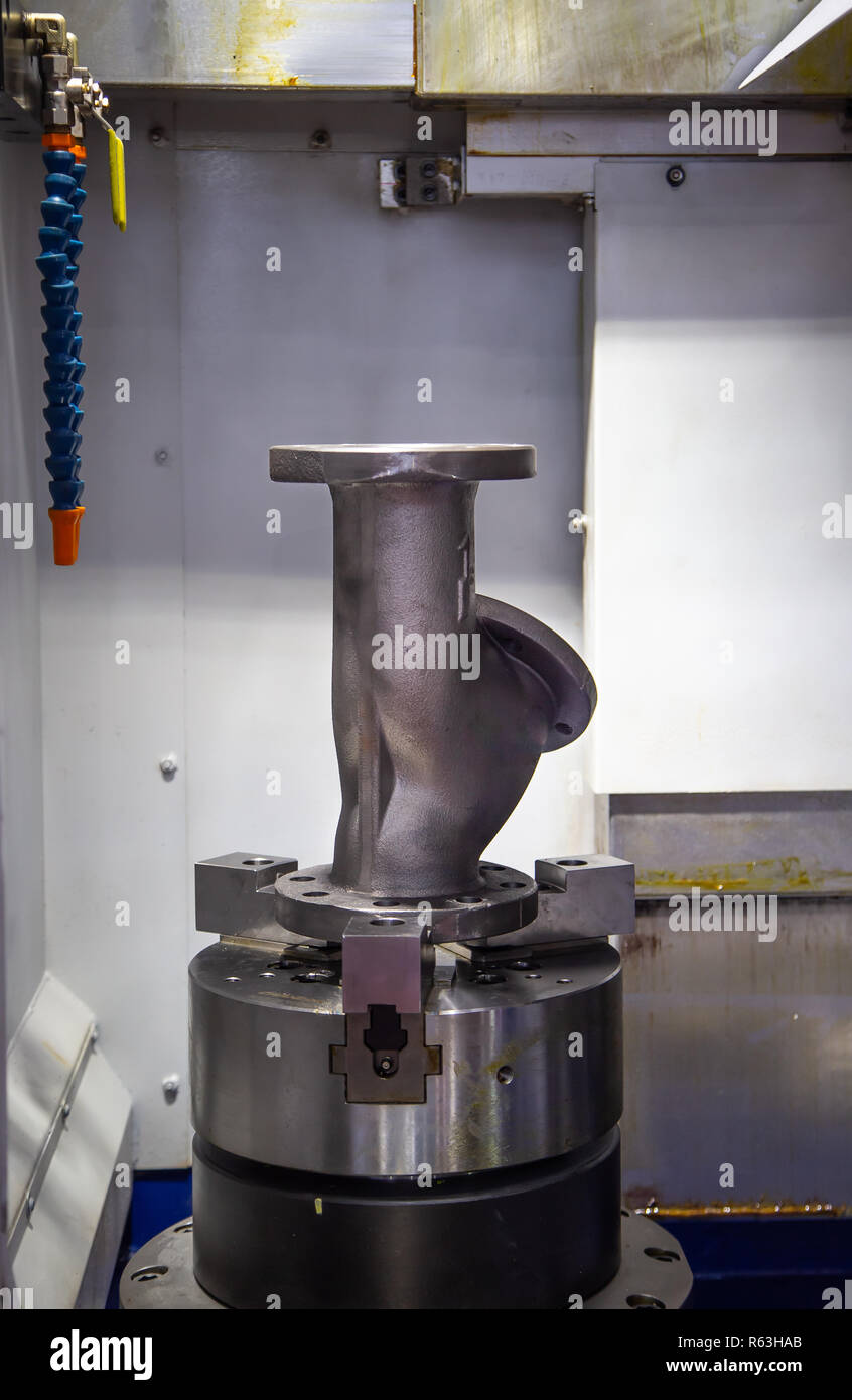 Succhieruola di pezzo sulla verticale Tornio CNC macchina Foto Stock