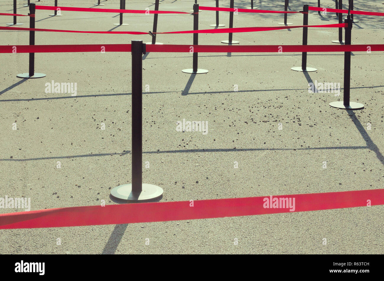 Accodamento retrattile Nastri guide e poli Foto Stock