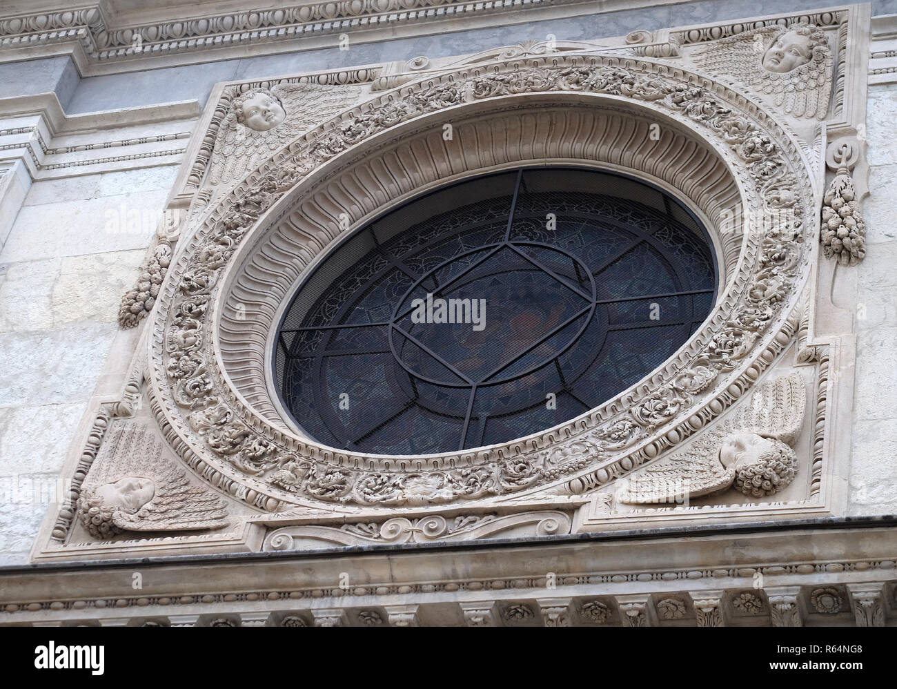Rosone sul portale della Cattedrale di San Lorenzo a Lugano, Svizzera Foto Stock
