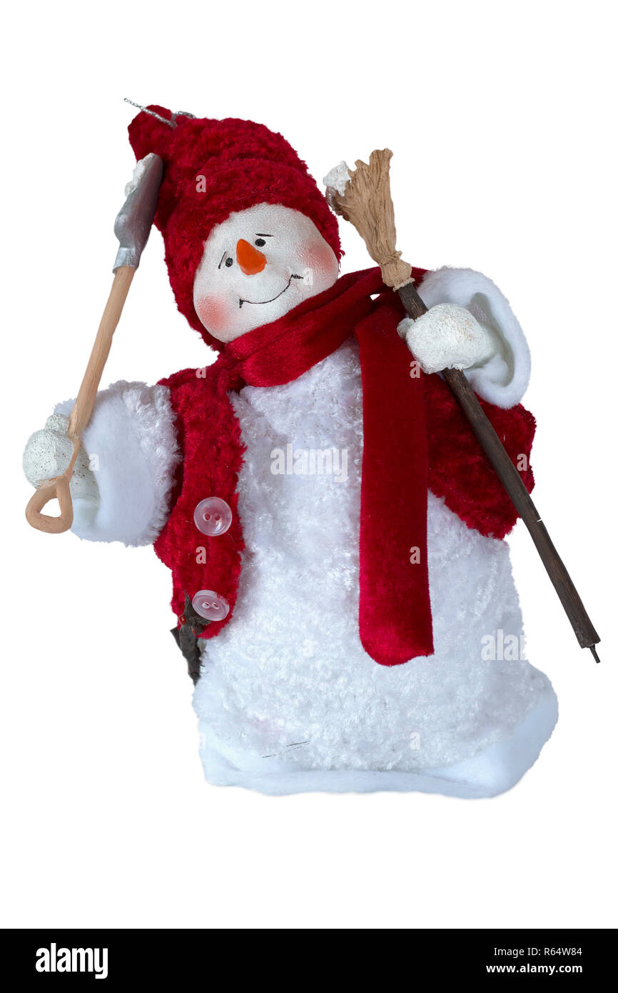 Allegro pupazzo di neve con la scopa e paletta contro sfondo bokeh di fondo. Buon anno nuovo spirito. Anno nuovo concetto di Natale Foto Stock