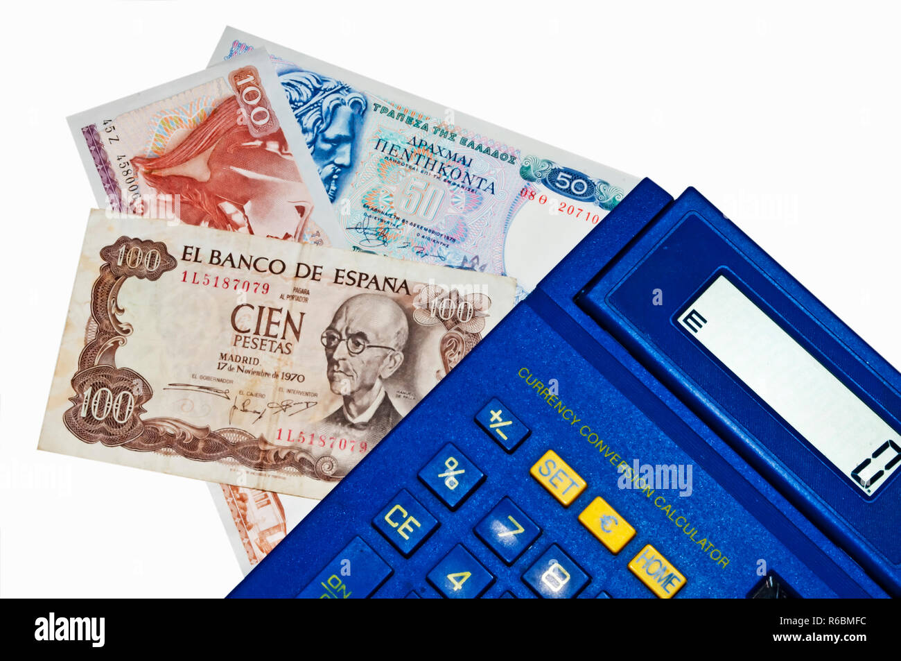 Euro-Crisis,calcolatrice con Peseta e Drachm Banconote Foto Stock