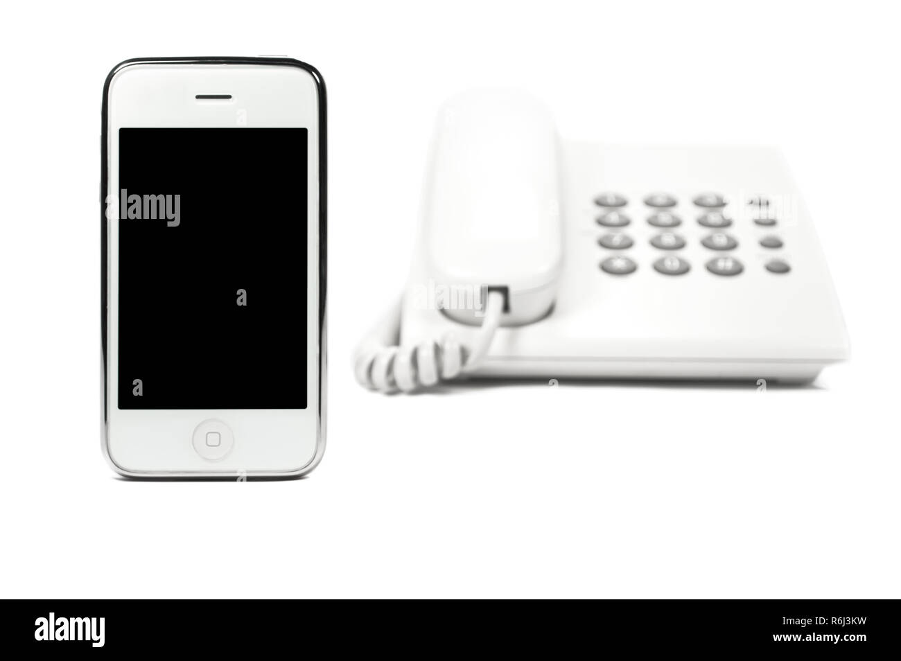 Smartphone e telefono isolato su sfondo bianco. Foto Stock