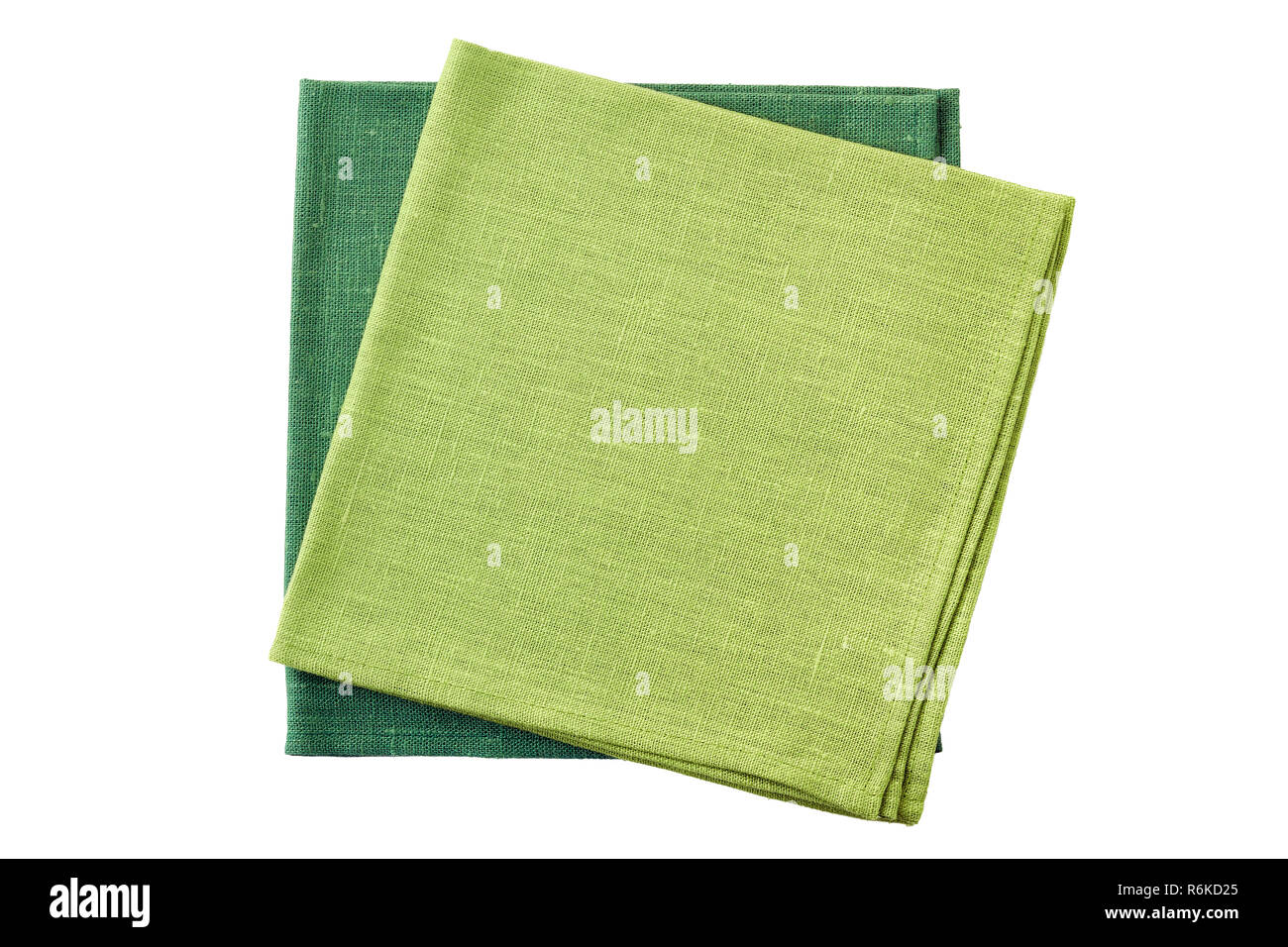 Due verdi piegati tovaglioli tessili isolati su sfondo bianco Foto Stock