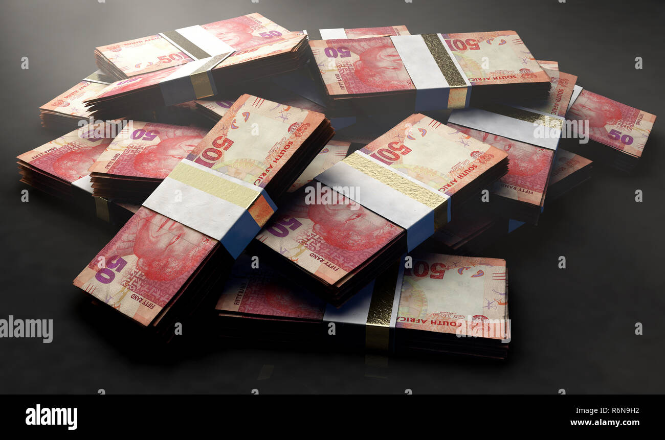 Un mucchio di casualmente disperse fasci di South African rand banconote isolato su un background - 3D render Foto Stock