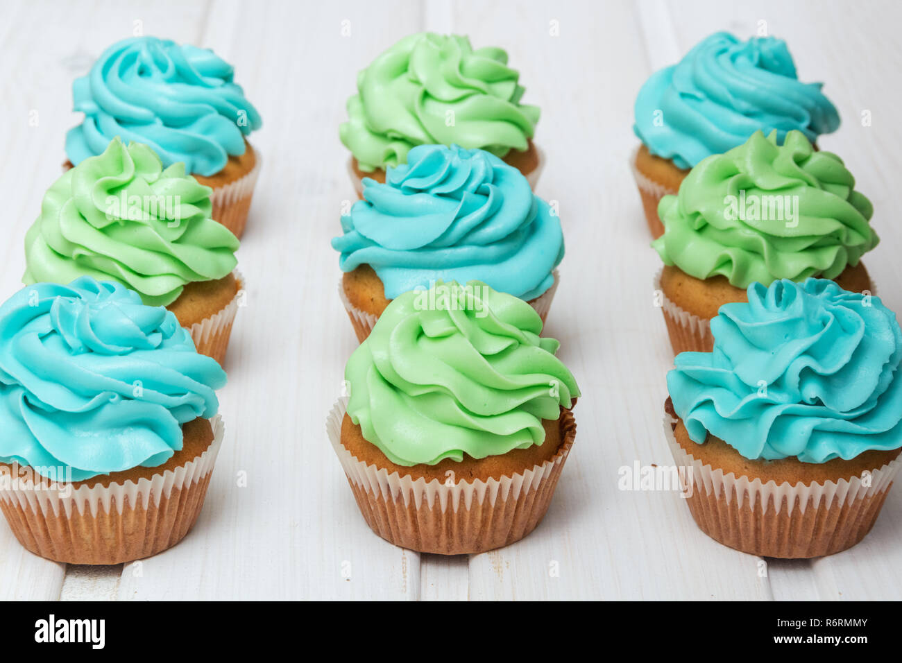 Tortine con il verde e il blu crema Foto Stock