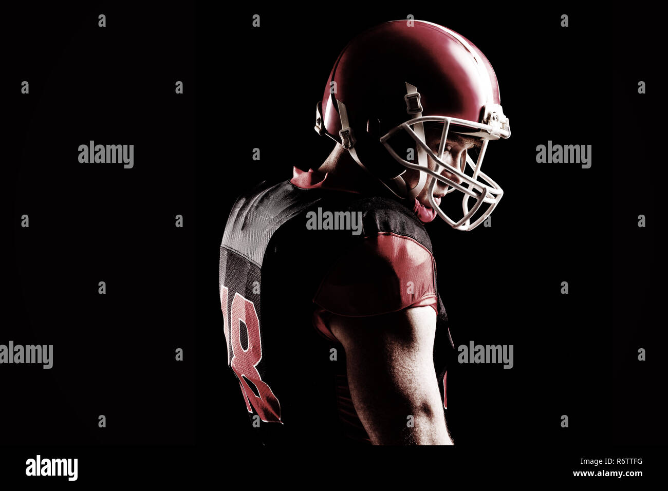 Giocatore di football americano nel casco Foto Stock