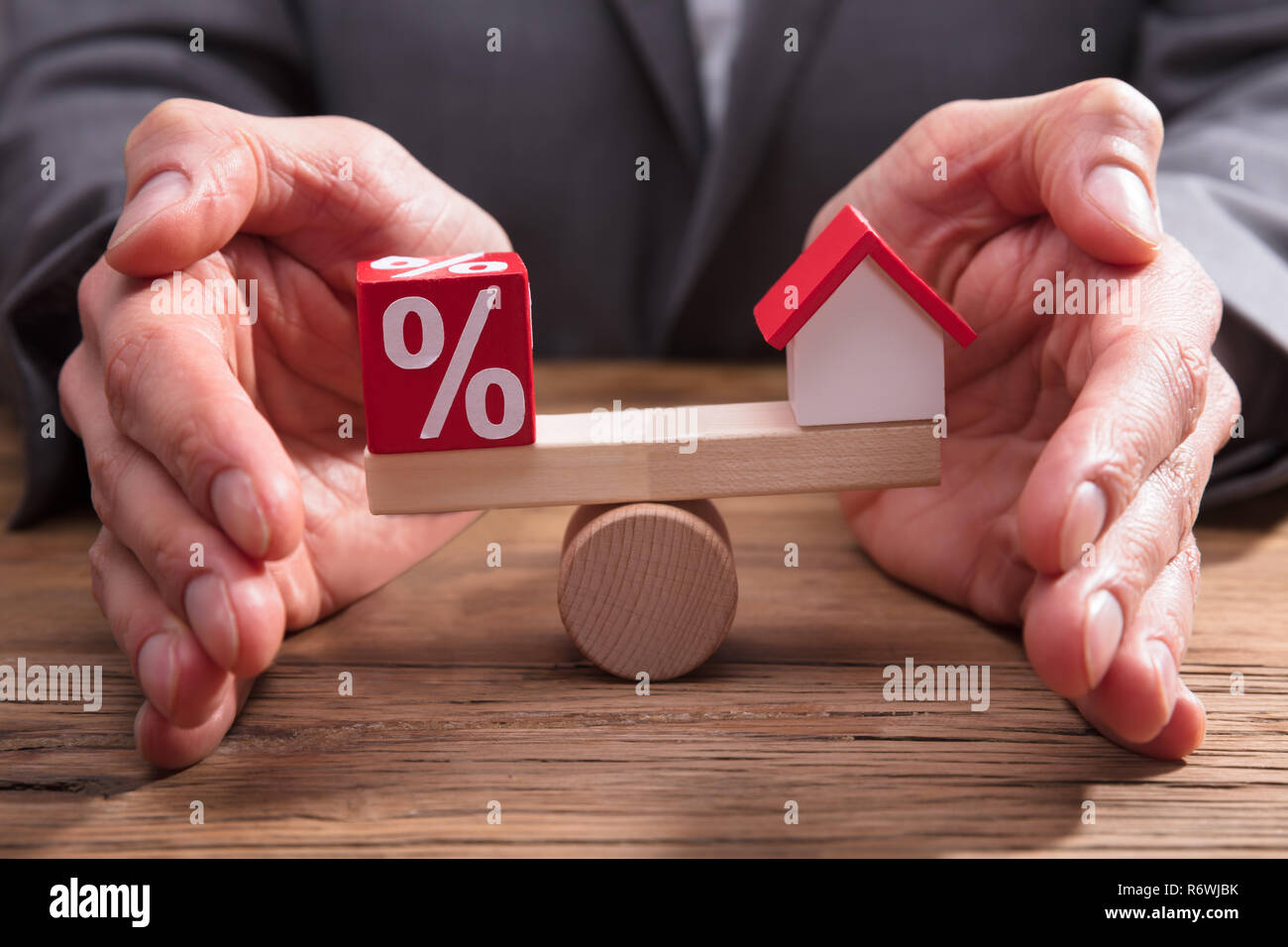 Commercianti la protezione di equilibrio tra percentuale e casa Foto Stock