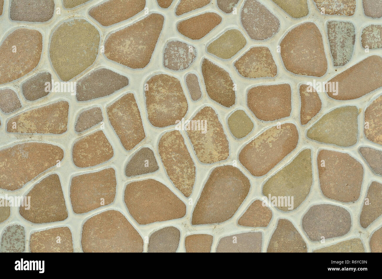 La pietra è una piastrella ceramica con una pietra rotonda pattern. Foto Stock