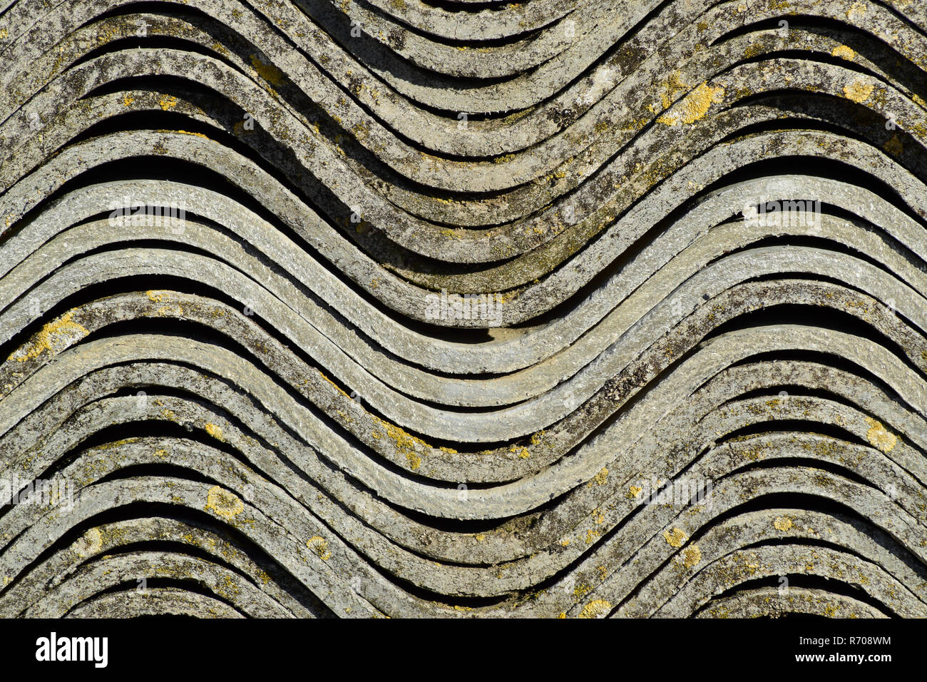 Ardesia ondulato consiste in un palo, vista laterale texture di sfondo di ardesia. Foto Stock