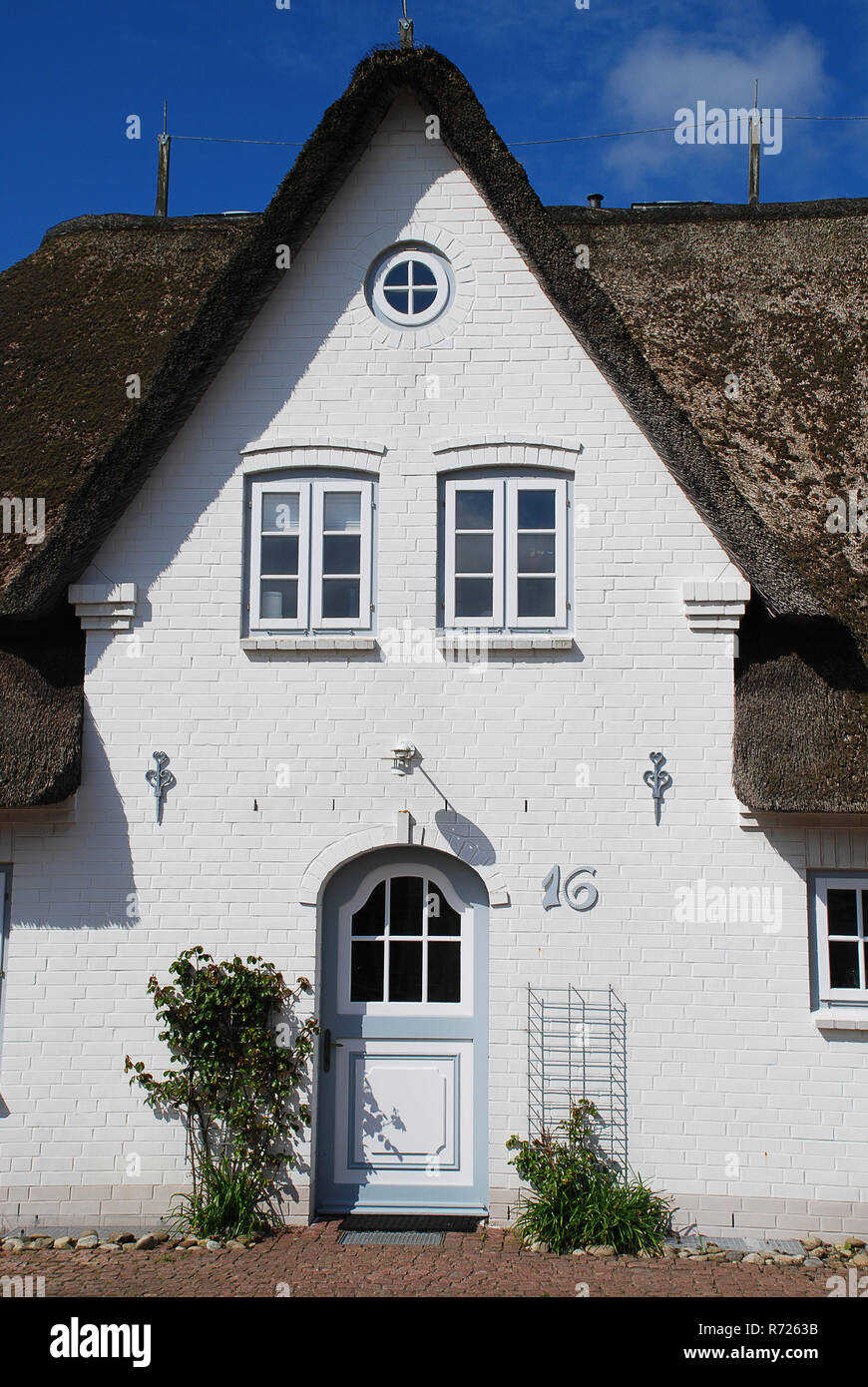 Tipica casa sull'isola Amrum (Germania).Amrum è uno del nord Isole Frisone sul tedesco costa del Mare del Nord, a sud di Sylt e a ovest di Foehr Foto Stock