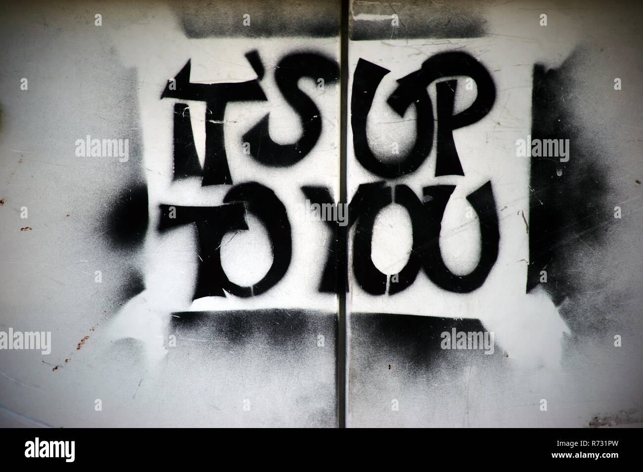 La slogan politici e la chiamata "il suo fino a voi' su una parete. Foto Stock