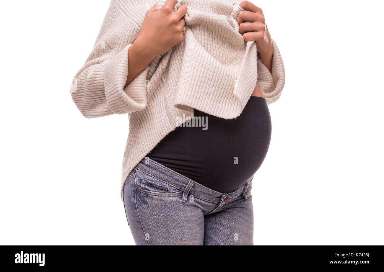 Jeans con un inserto elastico per le donne in stato di gravidanza. Foto Stock
