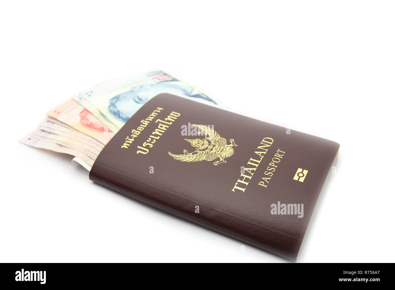 Thailandia passaporto con denaro Foto Stock