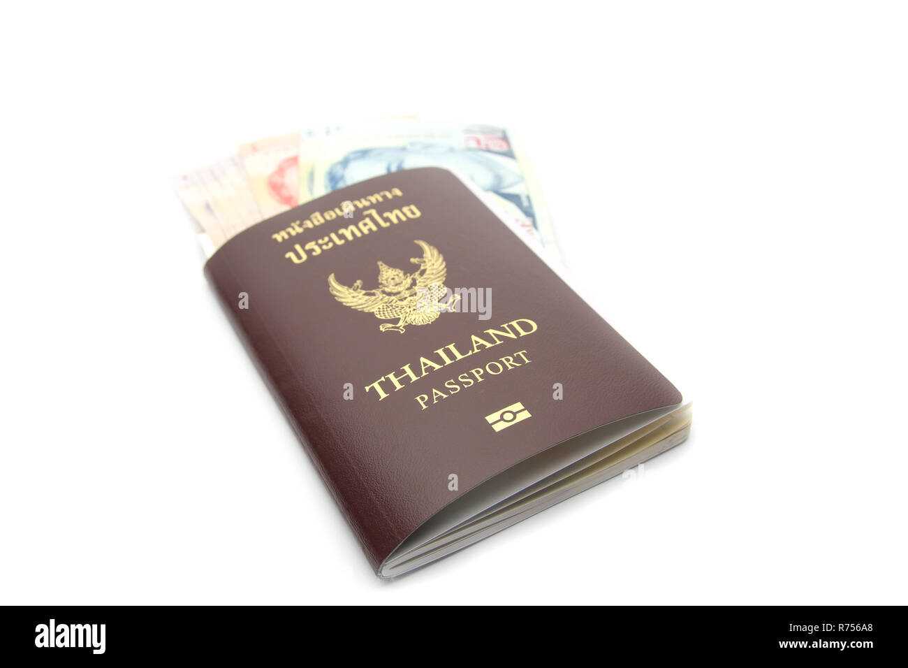 Thailandia passaporto con denaro Foto Stock