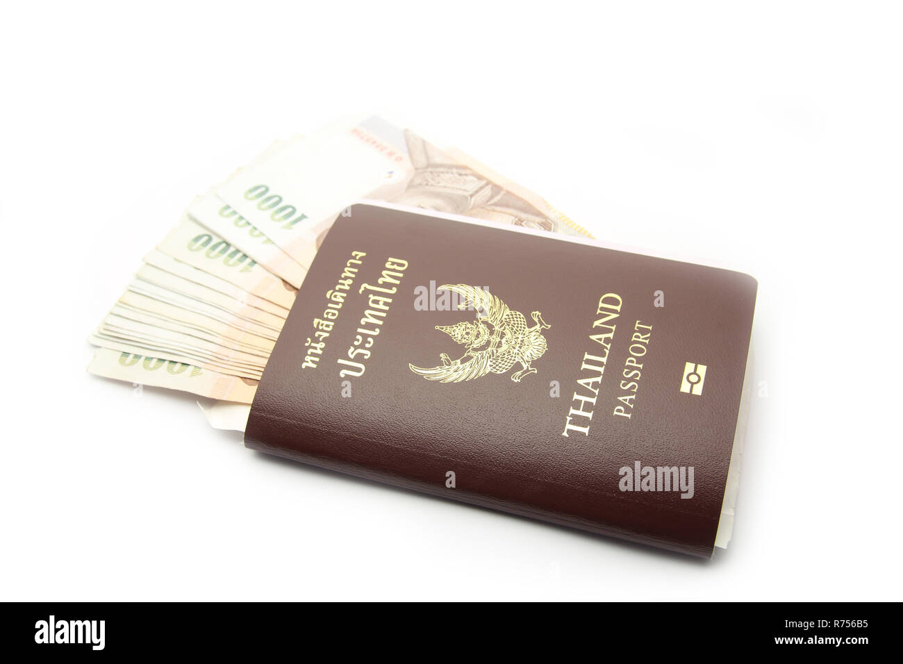 Thailandia passaporto con denaro Foto Stock