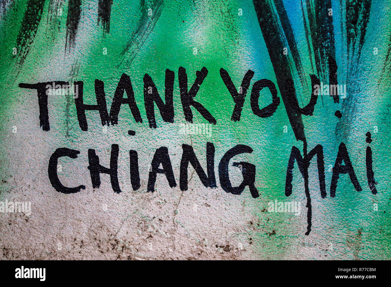 Un disegno dipinto graffiti in una strada in Thailandia Chiang Mai Foto Stock