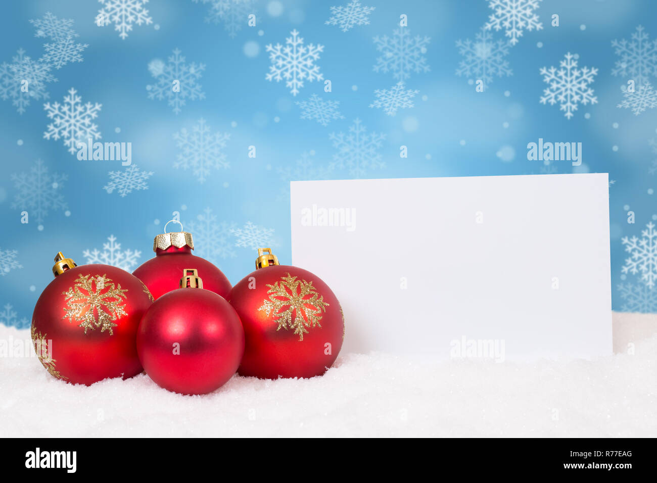 Rosso palle di Natale baubles wishlist desideri fiocchi di neve decorazione copyspace spazio copia Foto Stock
