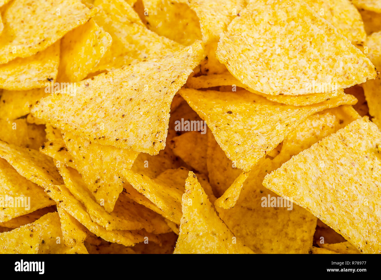 Potato Chips sfondo. Il fast food snack texture. Tortilla chips come una texture e lo sfondo Foto Stock