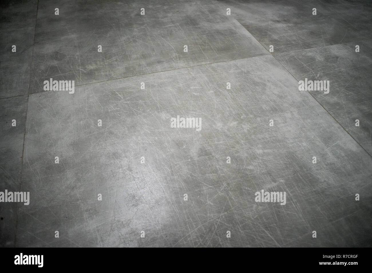 Un grungy vecchio texture in calcestruzzo di colore grigio Foto Stock