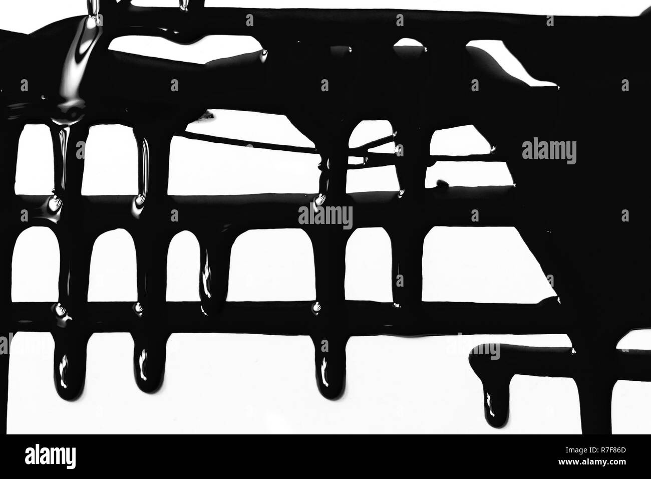 Flussi di vernice nera Foto Stock