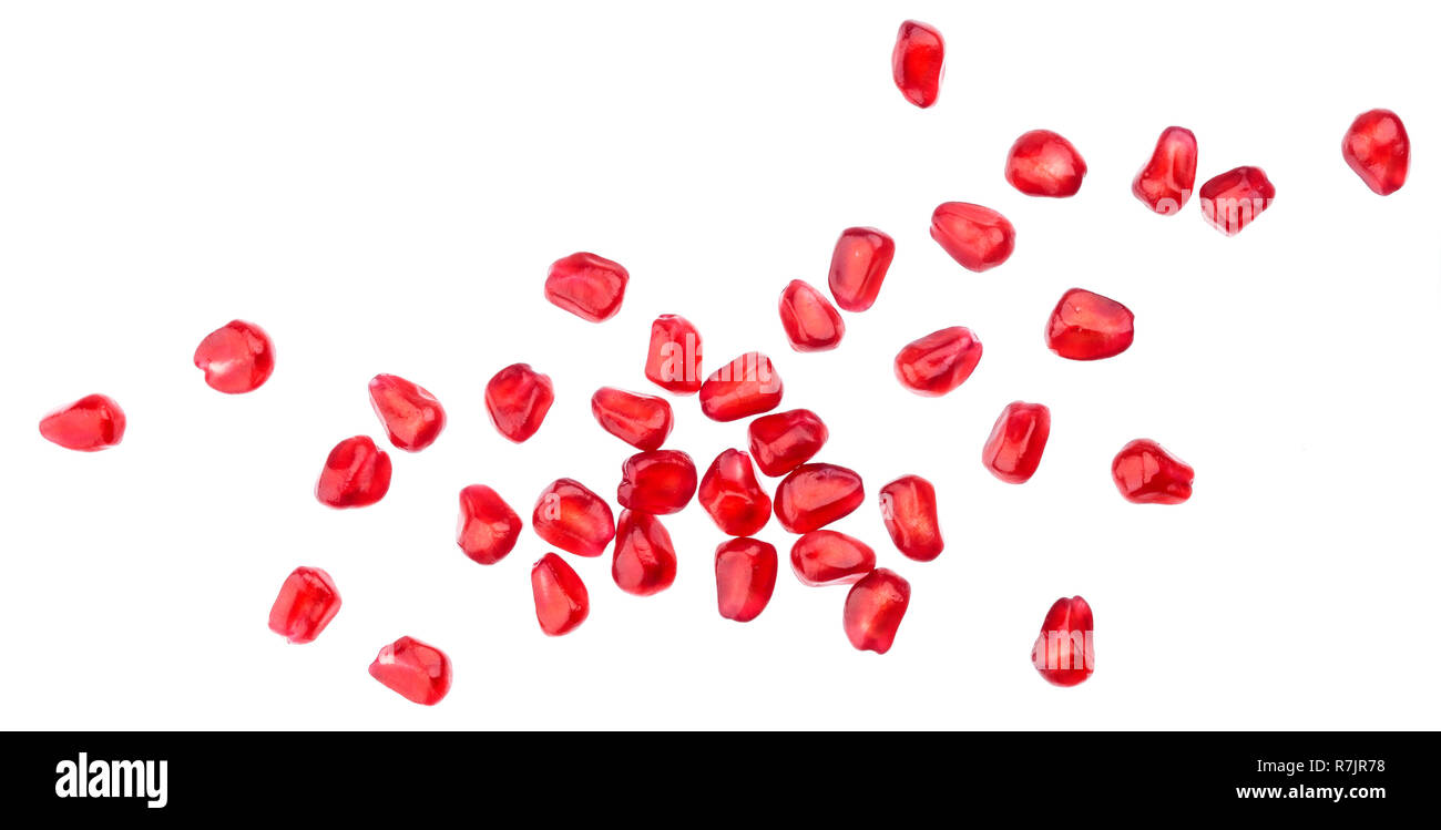 I semi di melograno isolati su sfondo bianco Foto Stock