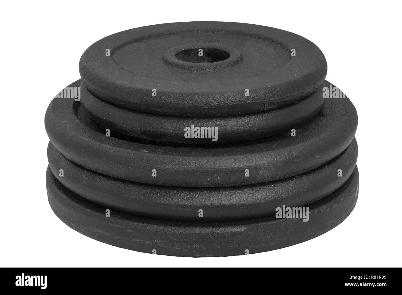 Pila di diversi formati di dischi dumbbell isolati su sfondo bianco. Foto Stock