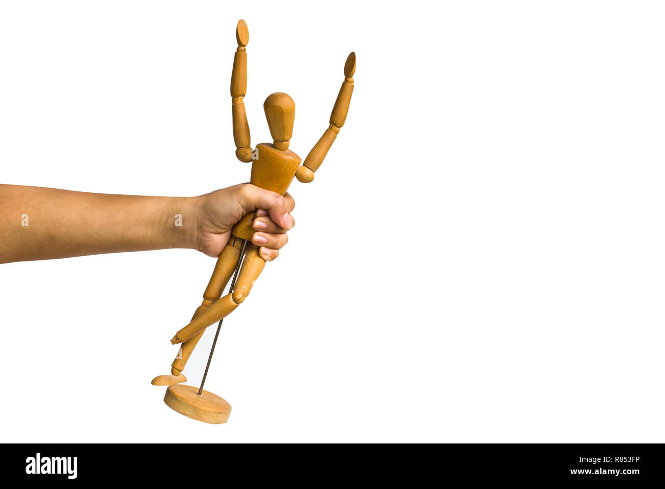 Un ritagliato femminile di mano azienda manichino di legno isolato su sfondo bianco includono percorso di clipping. Foto Stock