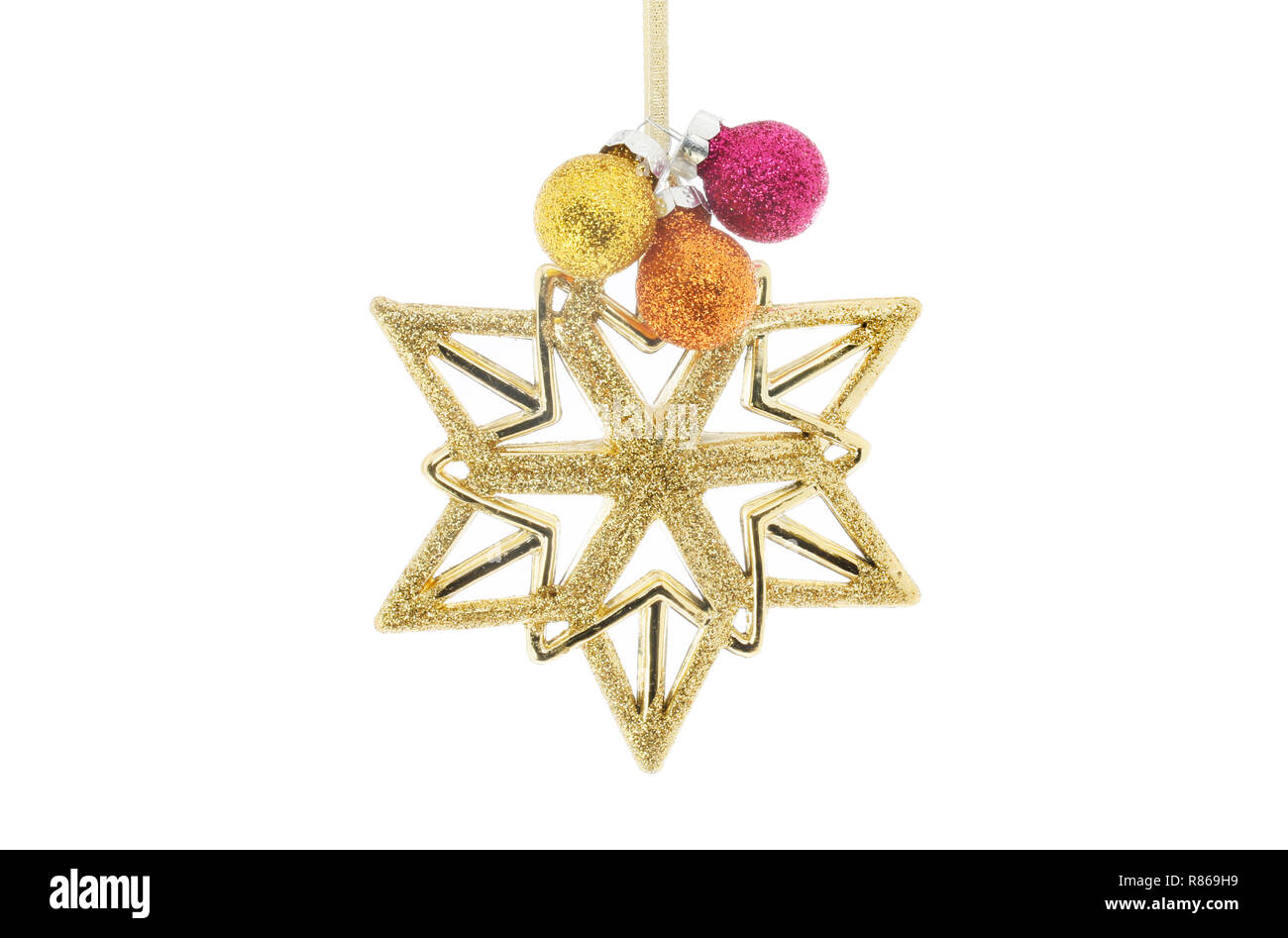 Oro glitter stella di Natale e tre baubles in miniatura isolata contro bianco Foto Stock