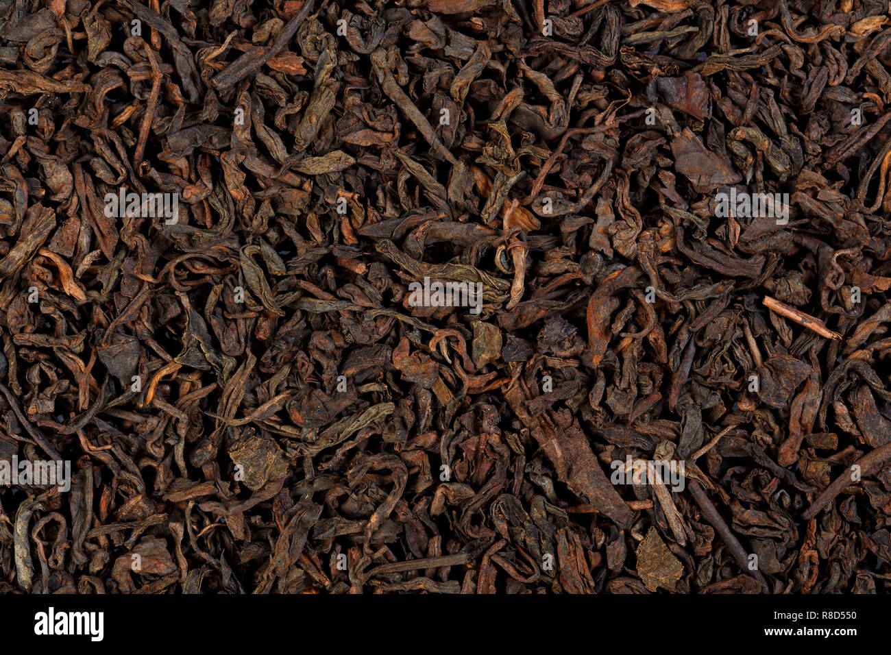 Puer materie tè. Pu-erh tè in forma di mattone. Macro vista ravvicinata. Foto Stock