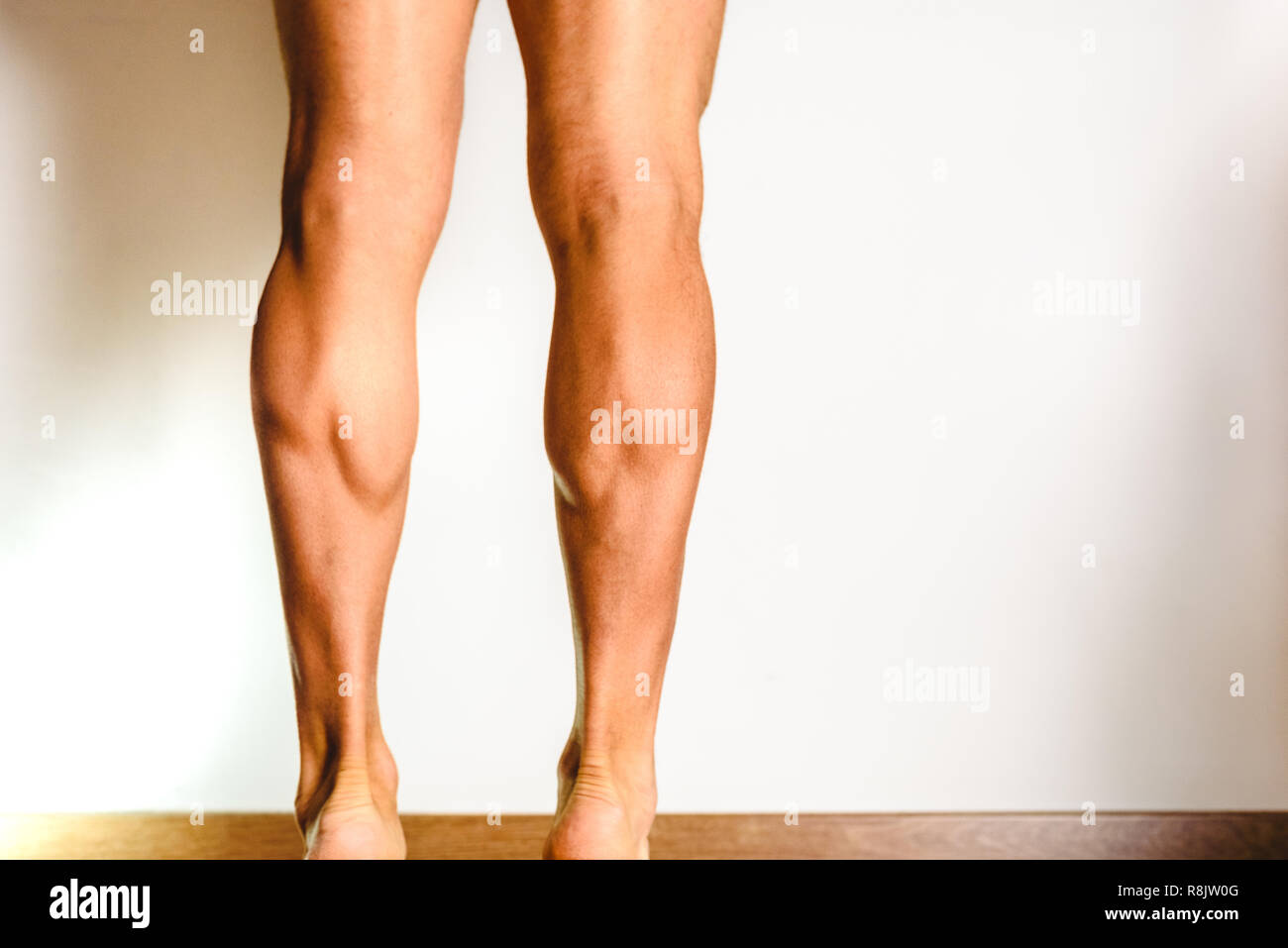 I muscoli della gamba posteriore, soleus e il muscolo gastrocnemio, la foto di un atleta. Foto Stock