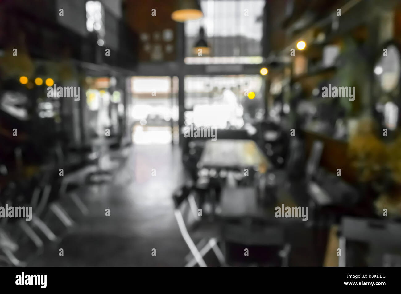 Cafe la sfocatura dello sfondo bokeh di fondo con luce. Ristorante abstract blur. Foto Stock