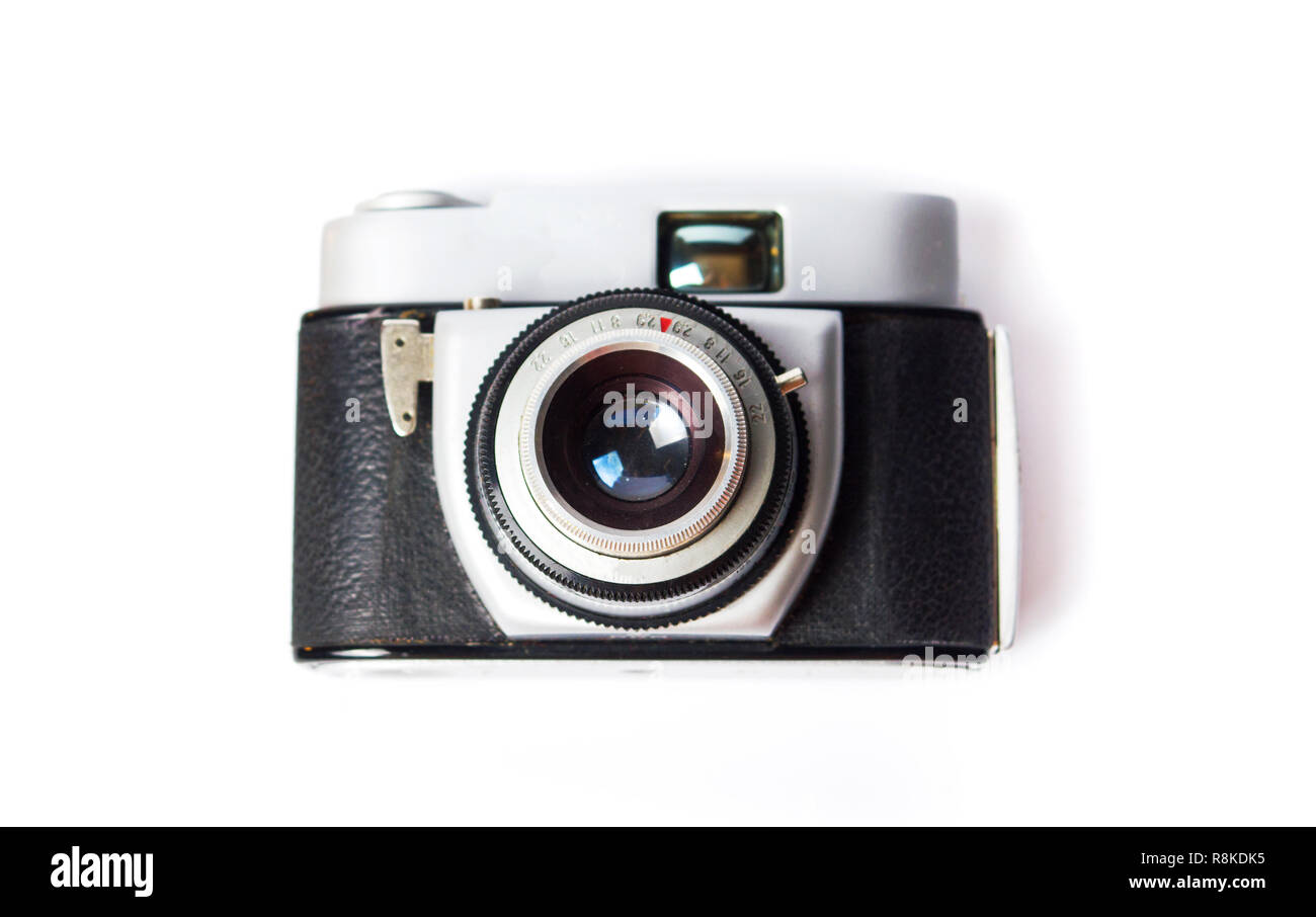 Vecchi Film fotocamera su sfondo bianco isolato Foto Stock