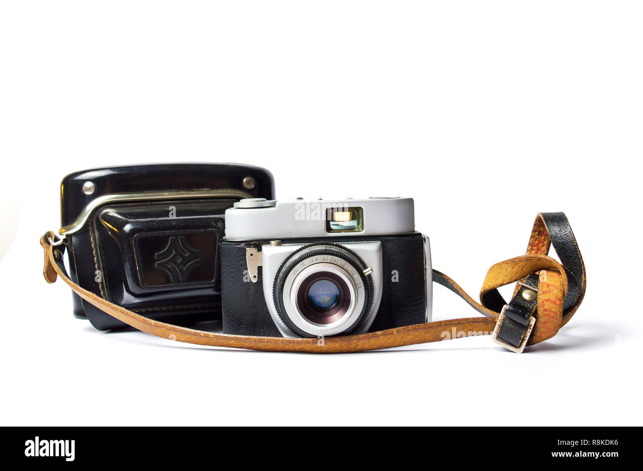 Vecchi Film fotocamera su sfondo bianco isolato Foto Stock