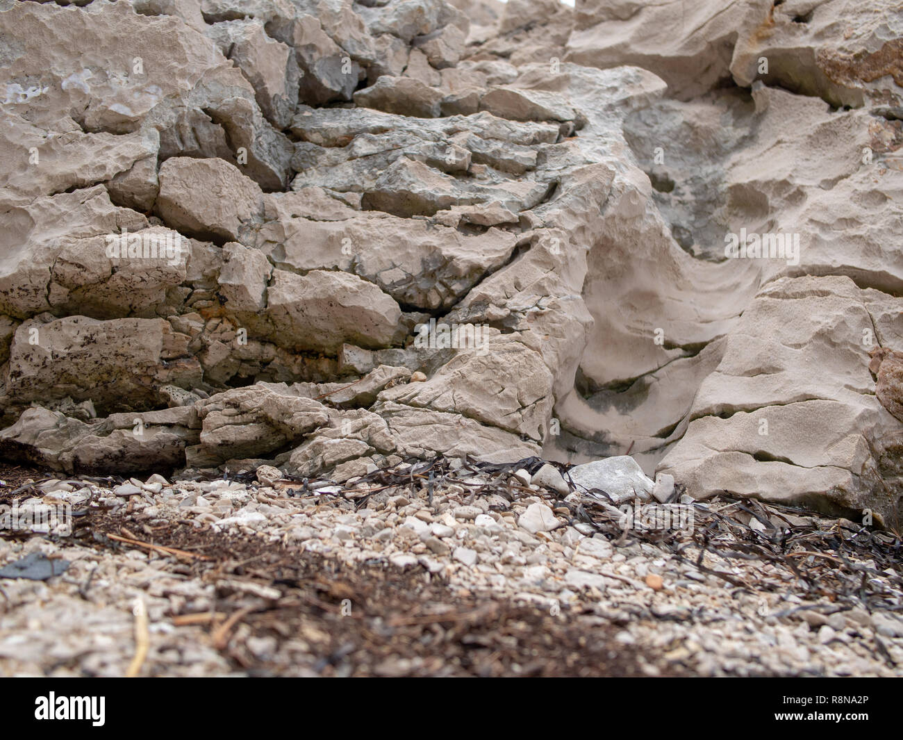 Le rocce in riva del mare. Foto Stock
