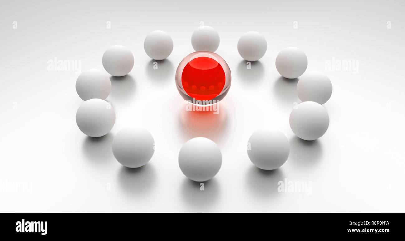 Un concetto per un incontro di gruppo. Sfera rossa è al centro di un gruppo di palle bianche. Simbolo per un team leader. Foto Stock