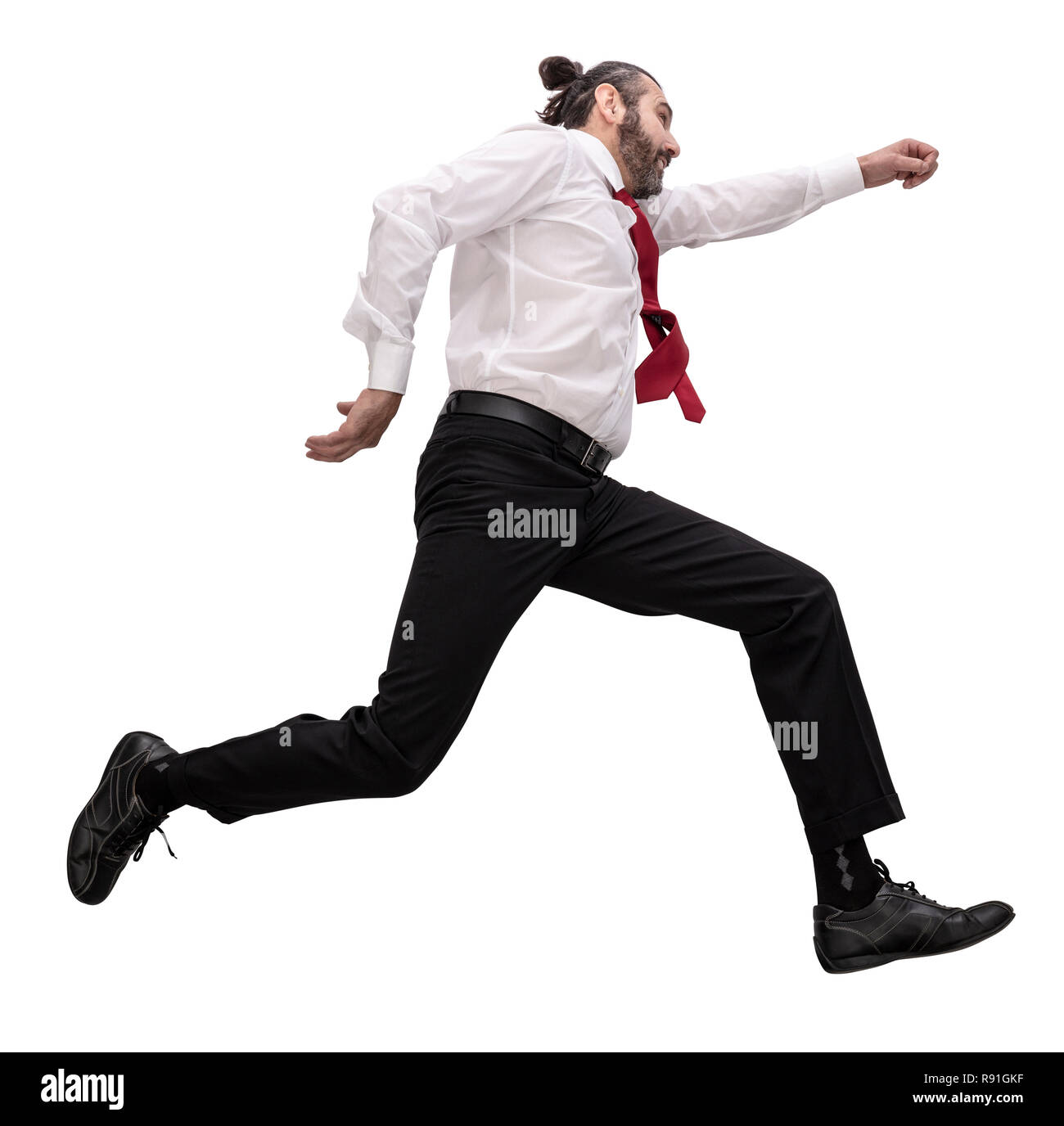 Uomo isolato saltando su sfondo bianco Foto Stock